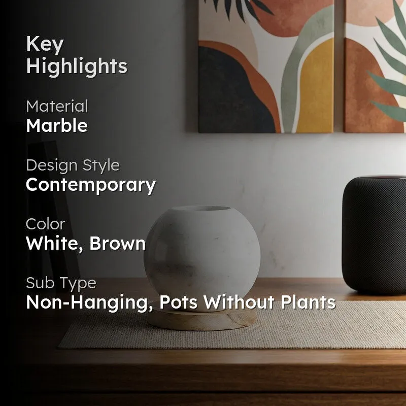 Styled view of the white and brown marble planter with product highlights
