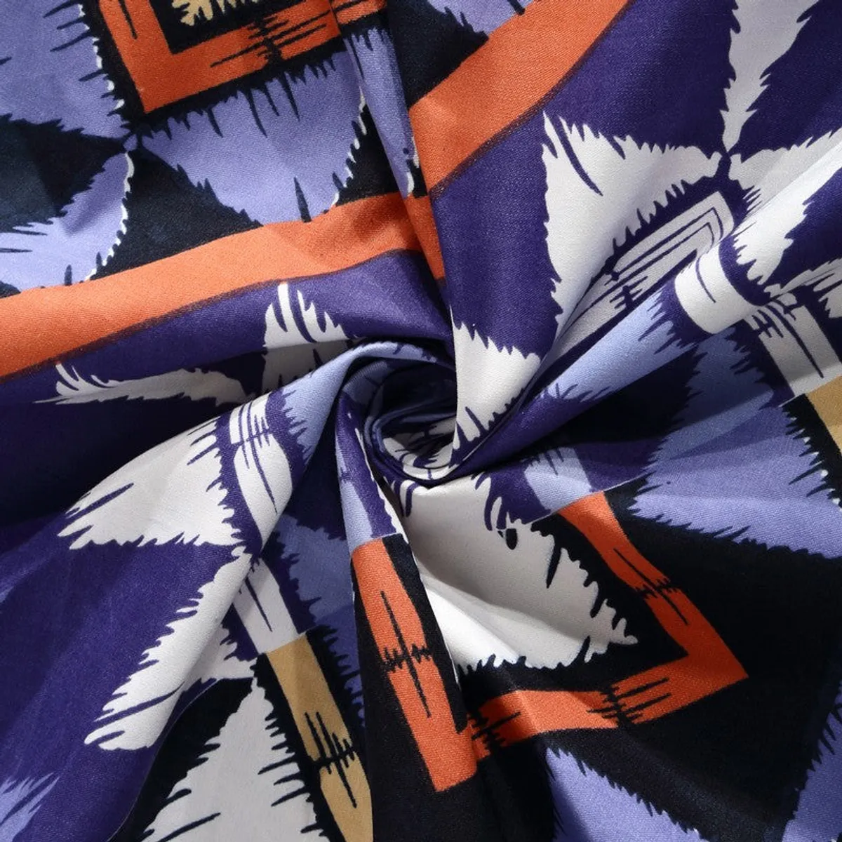 Close-up of multicolour geometric fabric from the diwan set