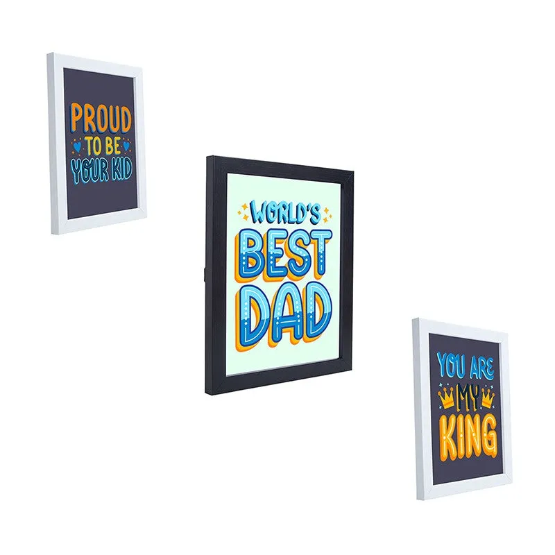 Angled view of three rectangular dad-themed typographic wall art pieces