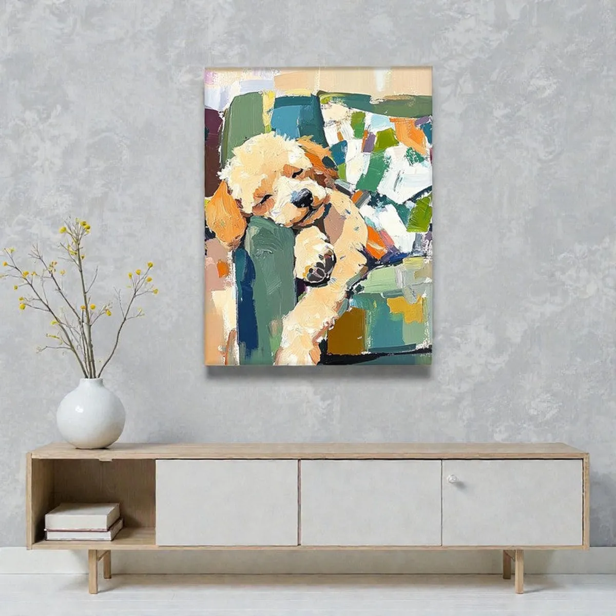 Abstract sleeping puppy wall art hung above a light wood console
