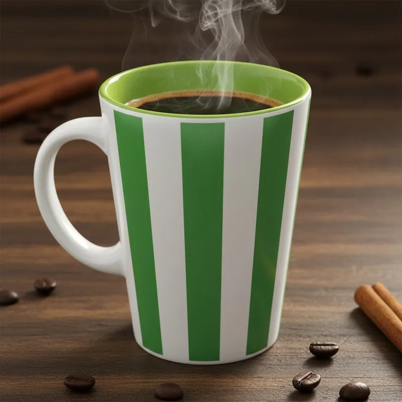 Close-up of a green and white striped mug filled with coffee