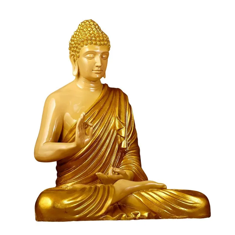 Gold seated Buddha idol photographed against a plain white background.