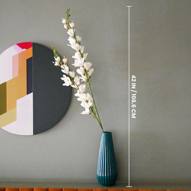 White artificial flower stick with 42-inch height marker, shown in a teal vase