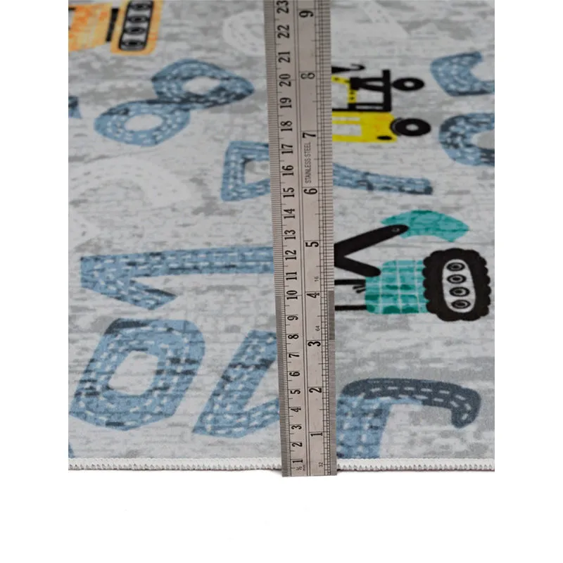 Close-up of carpet surface with number pattern and small vehicle motifs
