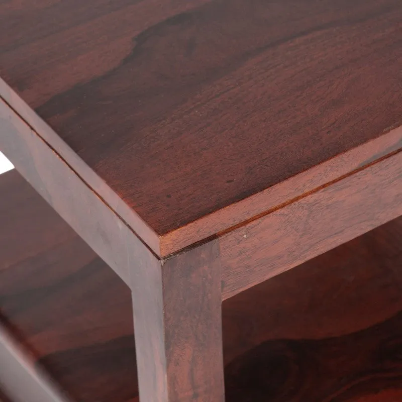Close-up view of the glossy dark brown wooden tabletop and grain.