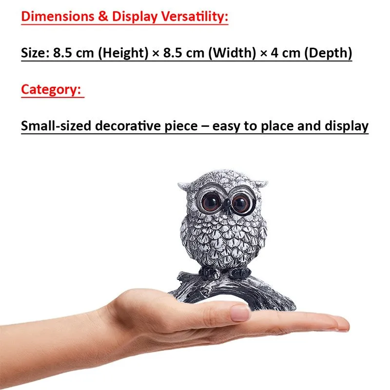 Small owl figurine displayed on an open palm for size perspective