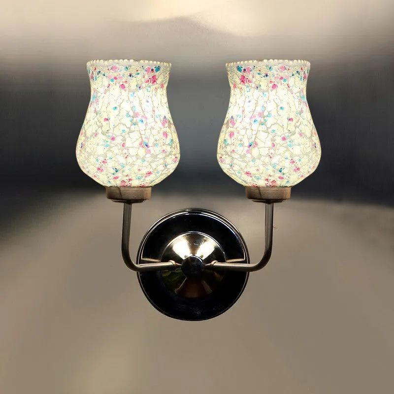 Close front view of illuminated crackle glass double wall lamp