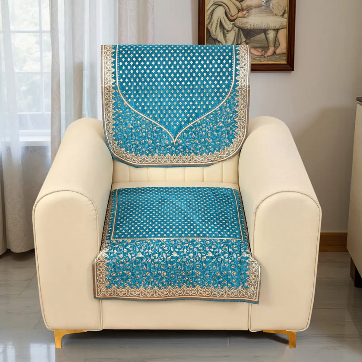Aqua blue patterned cover displayed on a single-seater armchair