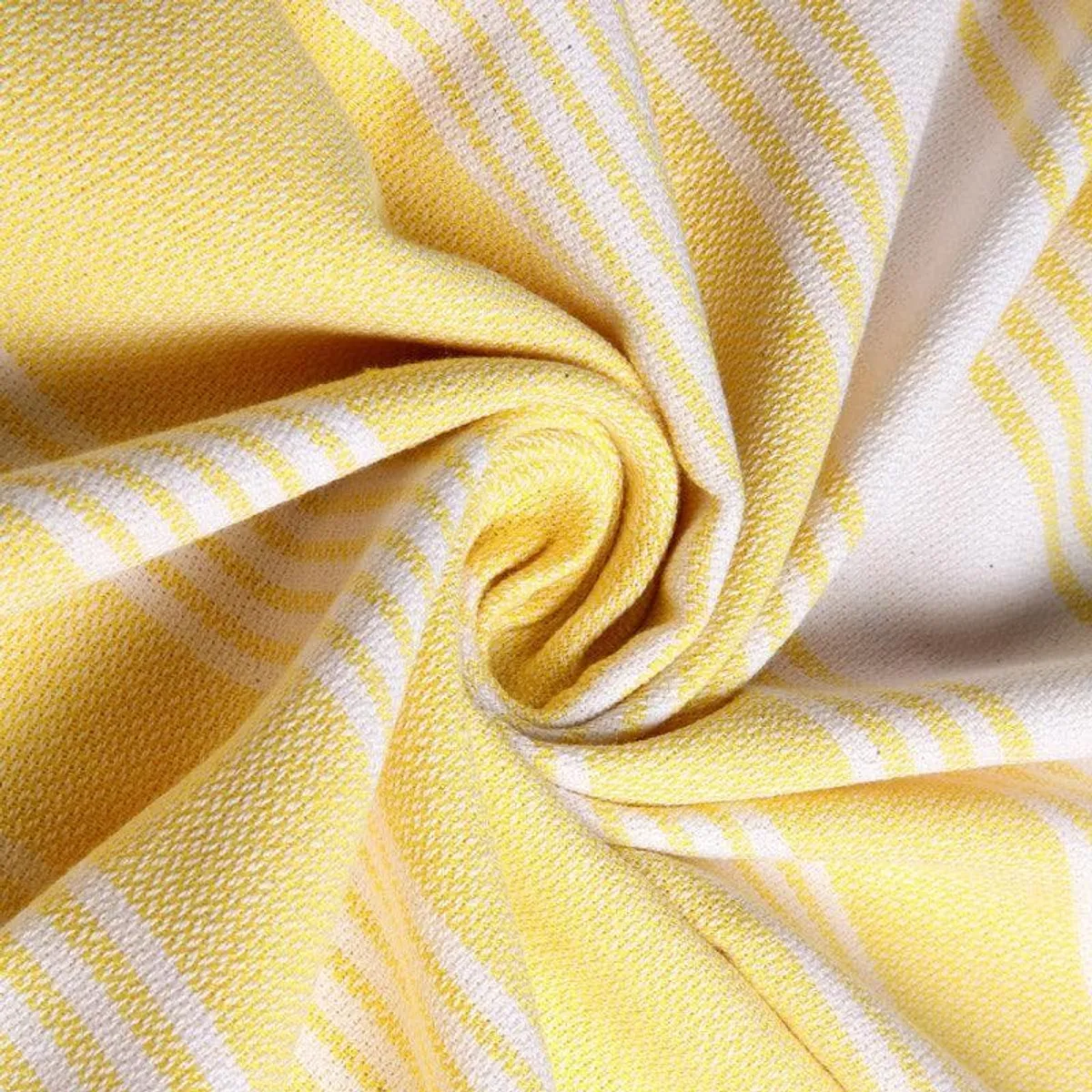 Close-up of yellow and white woven striped towel fabric