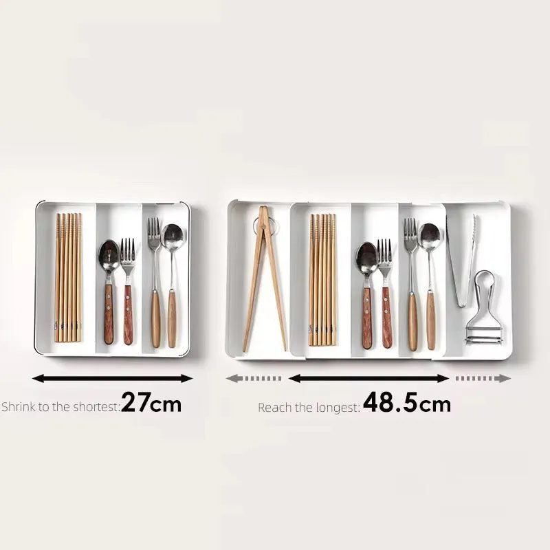 White cutlery trays displayed in compact and extended arrangements
