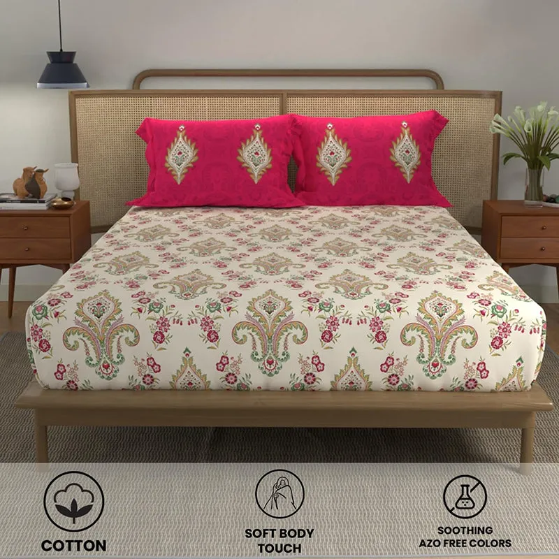 Front view of multicolour ethnic bedsheet with two bold pink pillow covers