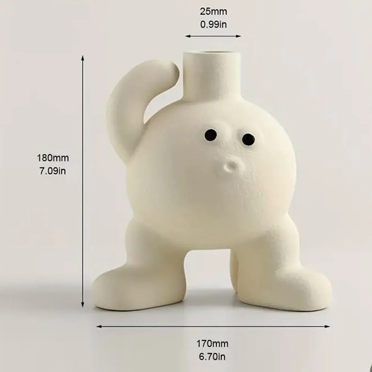 Front view of white character vase with printed dimensions