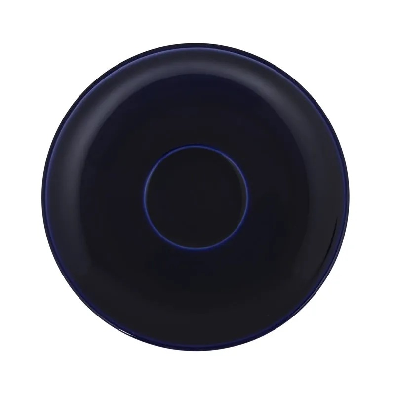 Top view of a blue saucer with a raised circular centre