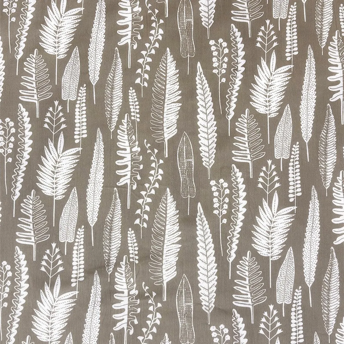 Close-up of white botanical leaf print on a brown dohar