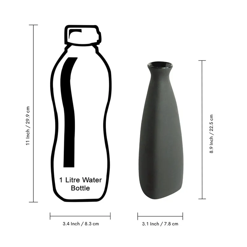 Black tapered vase beside a bottle illustration on a white background