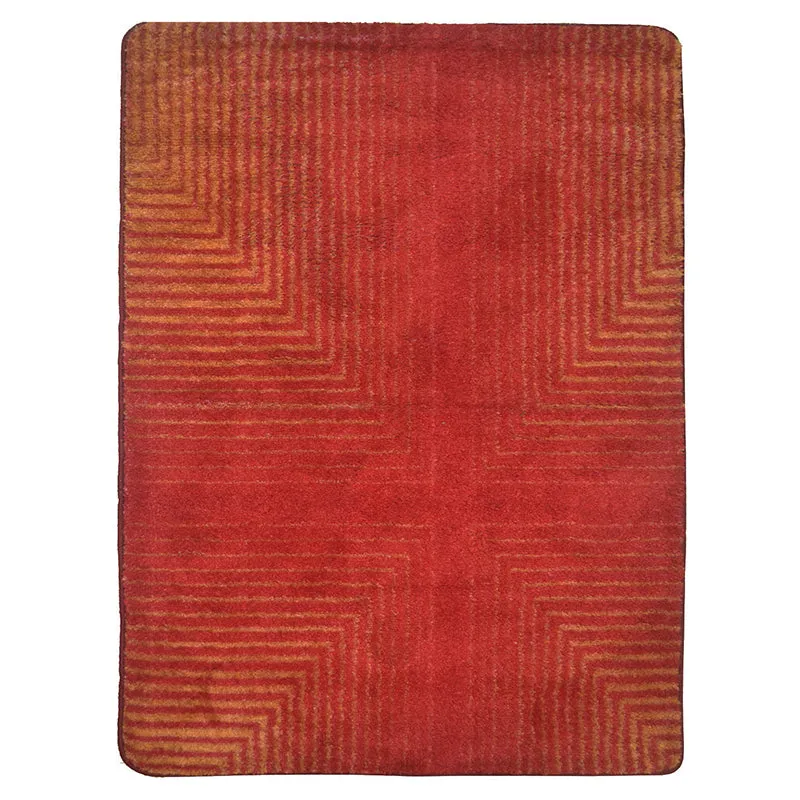 Rectangular orange-red rug with a geometric maze-like pattern on a white background