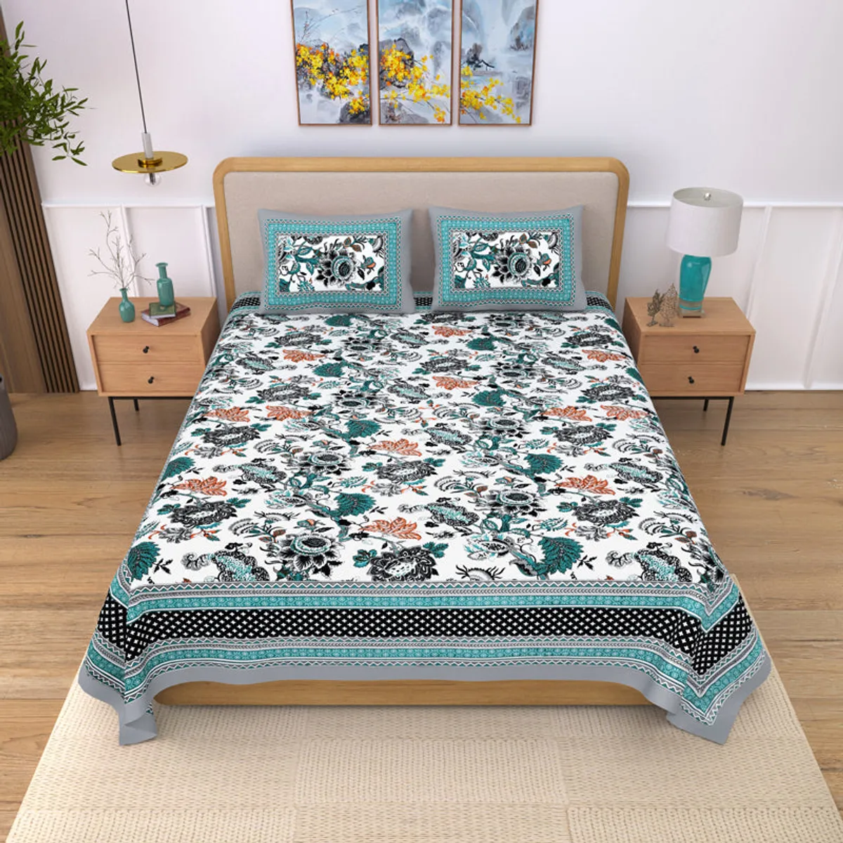 Floral ice blue bedsheet styled on a bed with two matching pillow covers
