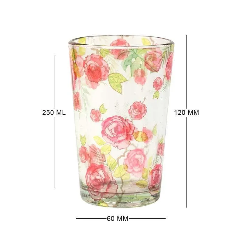 Single clear glass chai kulhad with pink rose and green leaf floral artwork
