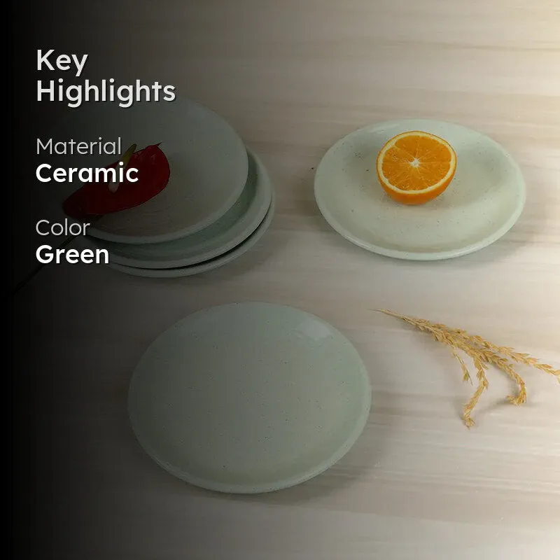 Pale green ceramic quarter plates with text overlay