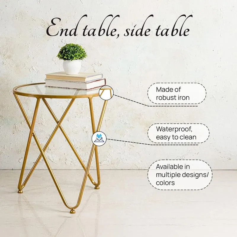 Gold round side table with clear glass top and crisscross metal base