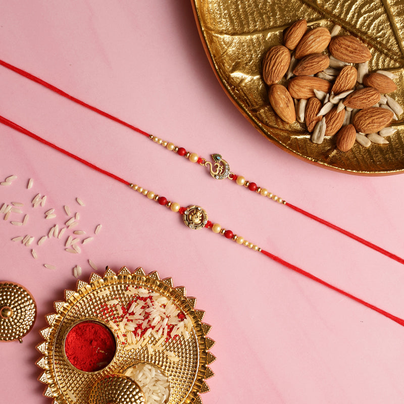 Om Ganesha Rakhi with Roli Chawal - Three Piece Set