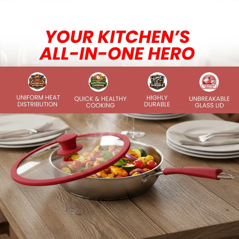 Covered frying pan with vegetables and red handles placed on a dining table.
