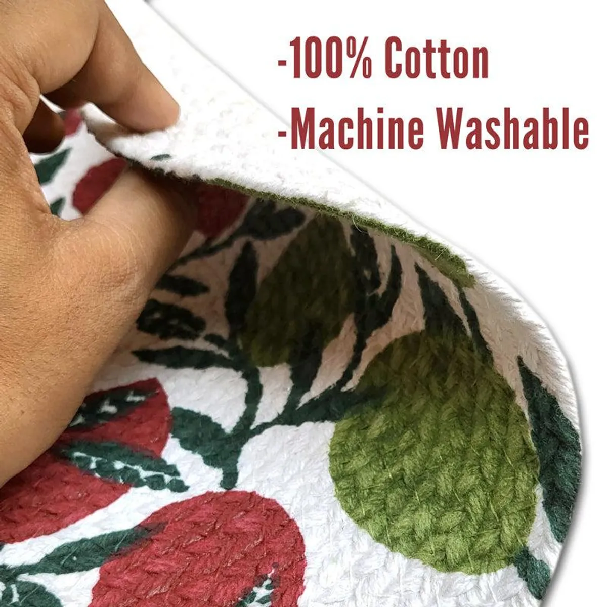 Close-up of the printed cotton placemat edge and textured fruit pattern.