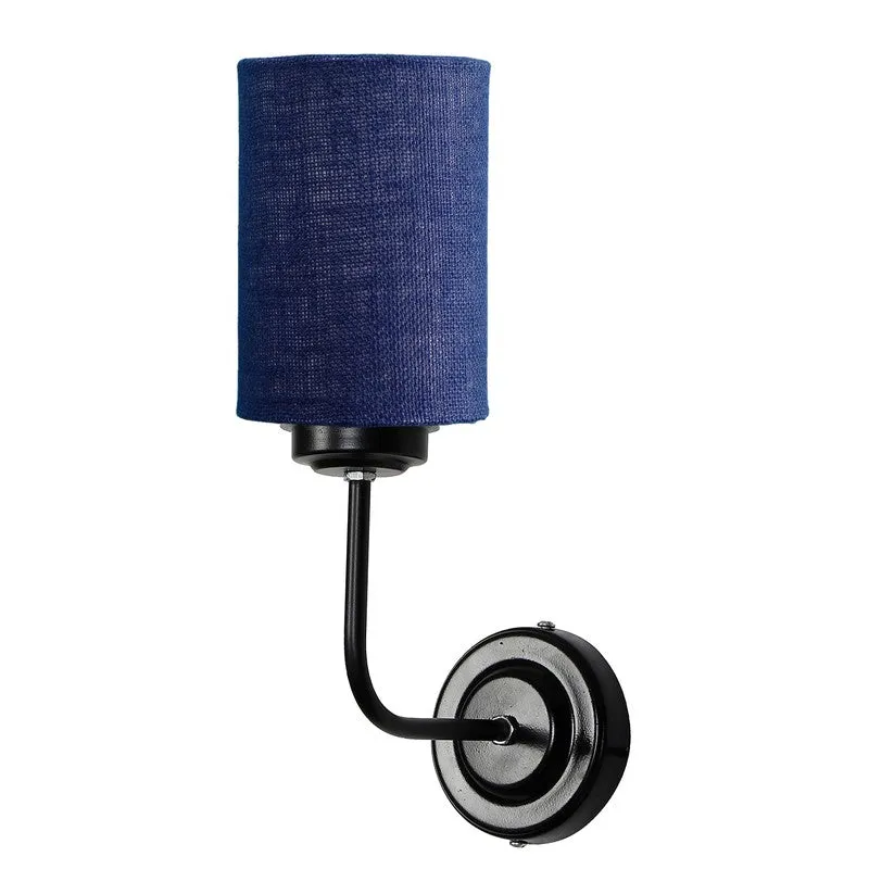 Angled view of blue jute wall lamp with black iron arm and base