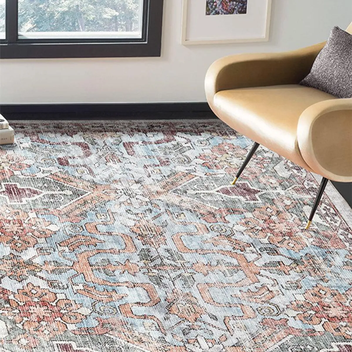 Patterned rectangular carpet styled in a living room beside a modern chair