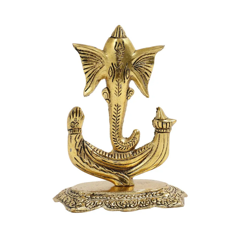 Close view of the gold-toned Vinakaya idol with ornate detailing