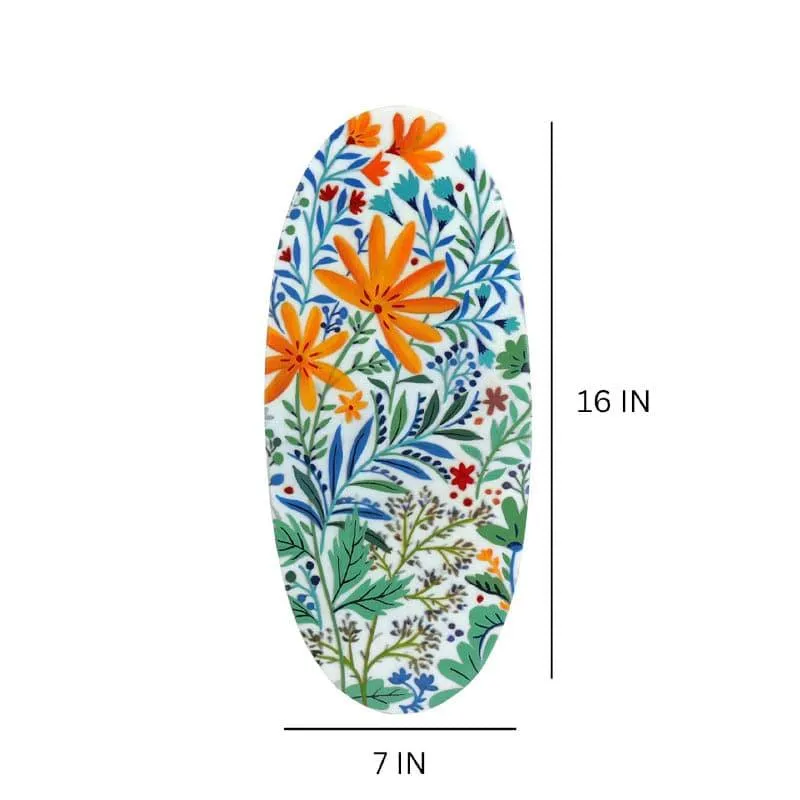Oval multicolour floral wall accent with orange flowers and blue-green foliage