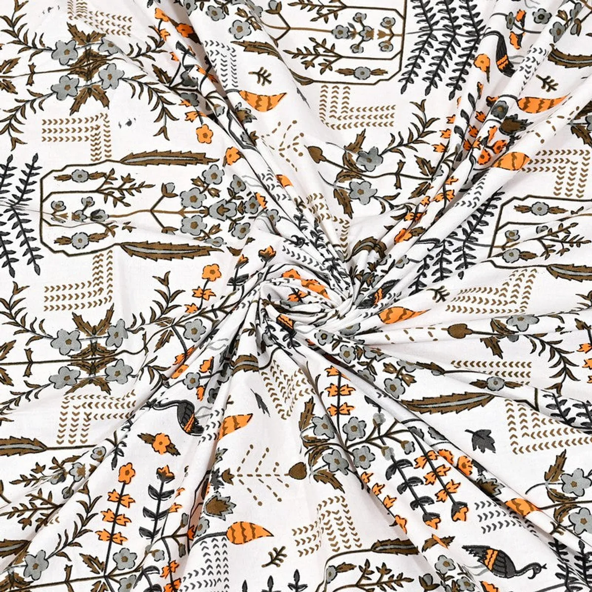 Close-up of the printed cotton fabric draped in soft folds