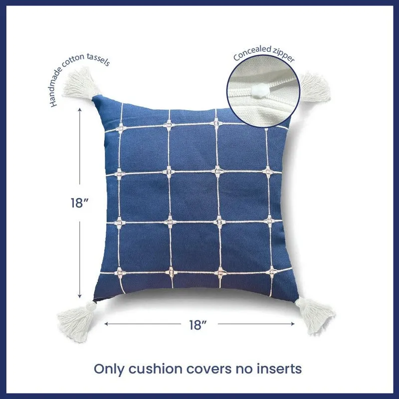 Single blue square cushion cover with tassels shown against a white background