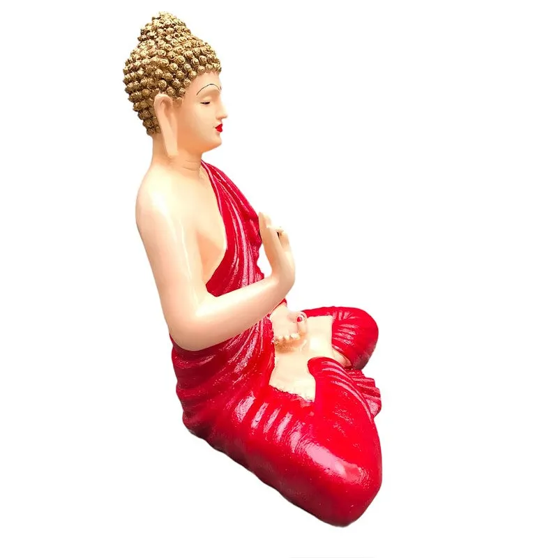 Side view of red and ivory Buddha showpiece