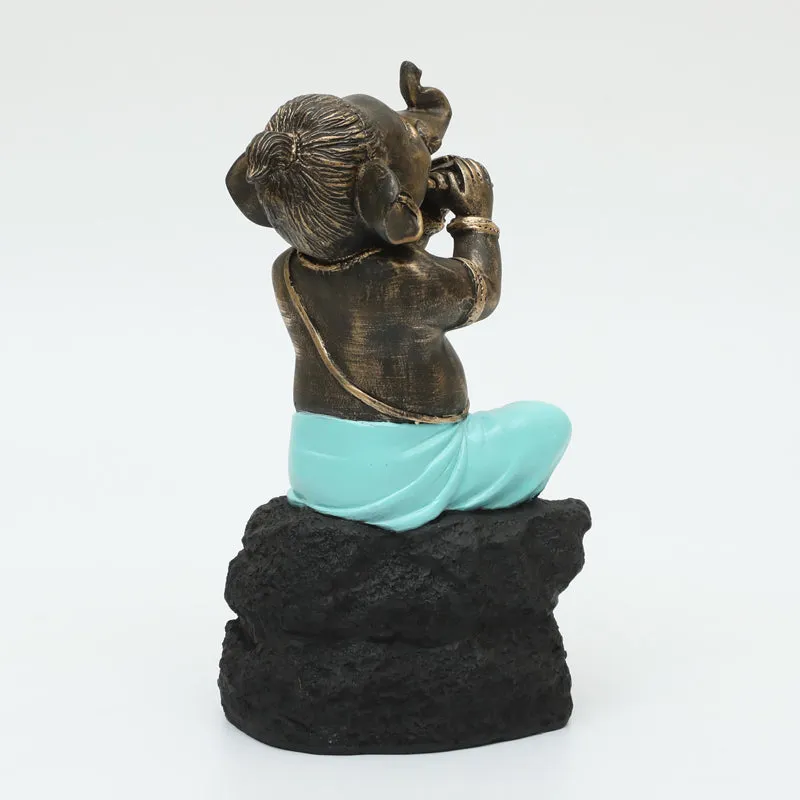 Playful Vinayaka Showpiece - Brown, Blue media 5