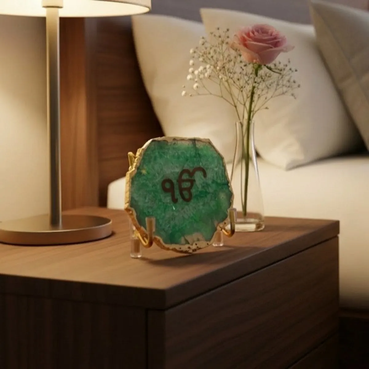 Green Ik Onkar agate accent styled on a bedside table