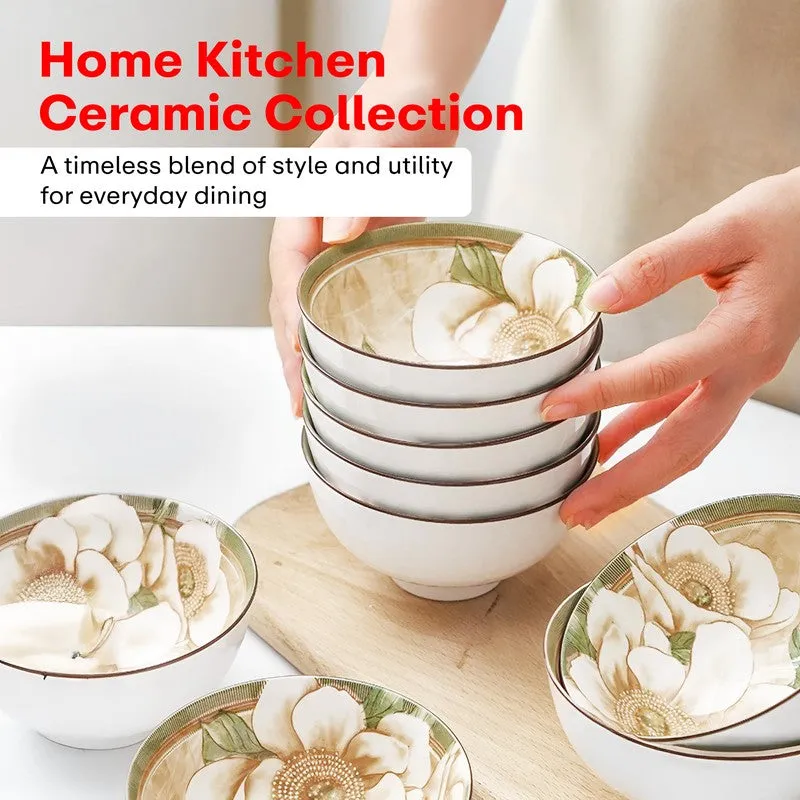 Floral ceramic bowls stacked and displayed on a kitchen counter