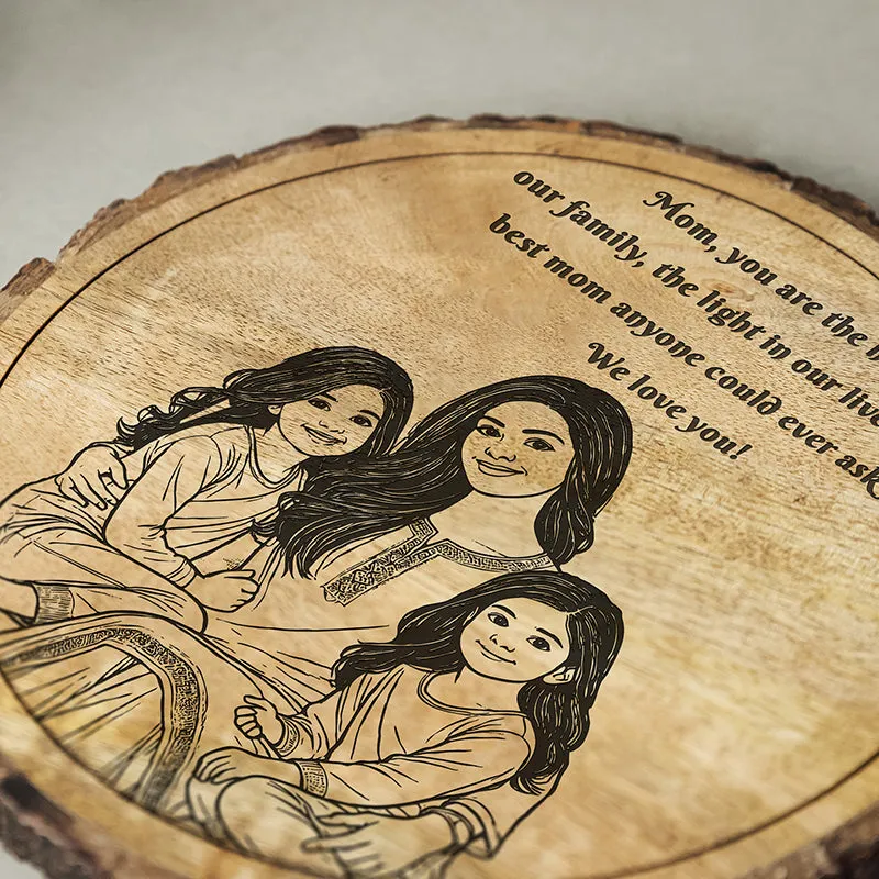 Close-up of the engraved family illustration on the round wooden showpiece