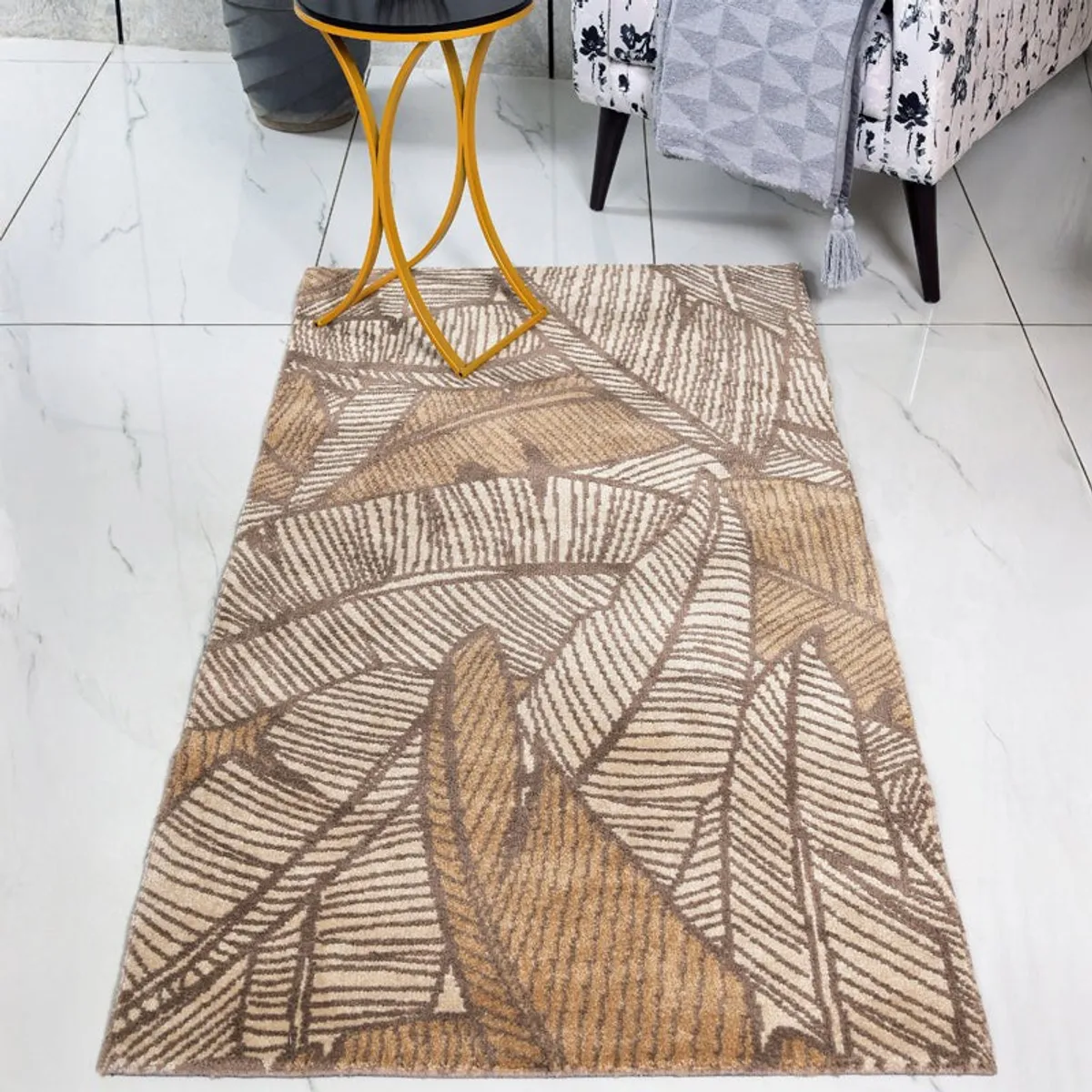 Brown abstract leaf carpet styled beneath a side table