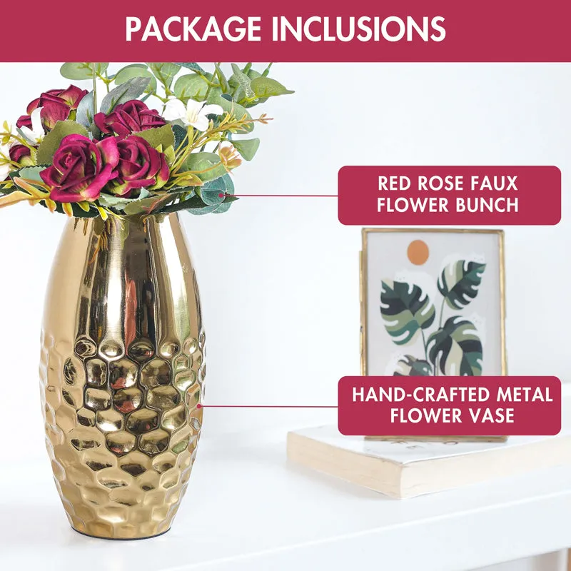 Artificial rose bouquet in a gold hammered vase styled on a tabletop