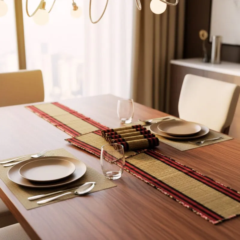Maroon and black runner arranged lengthwise on a dining table