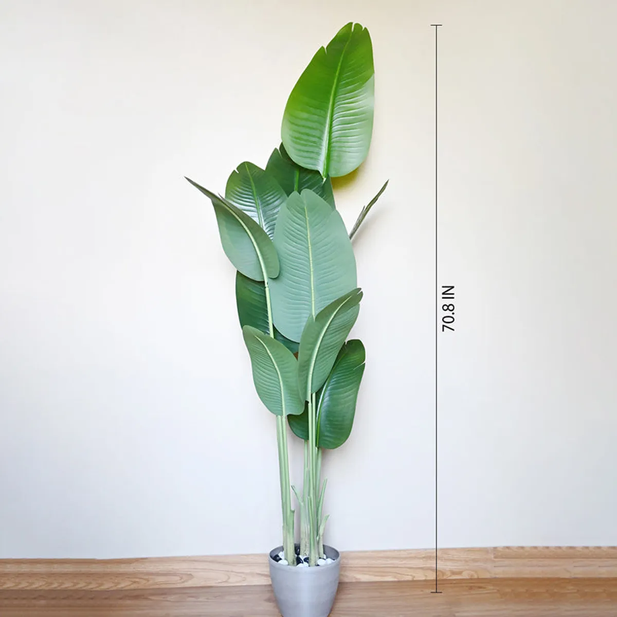 Artificial plant with height guide shown beside the leaves
