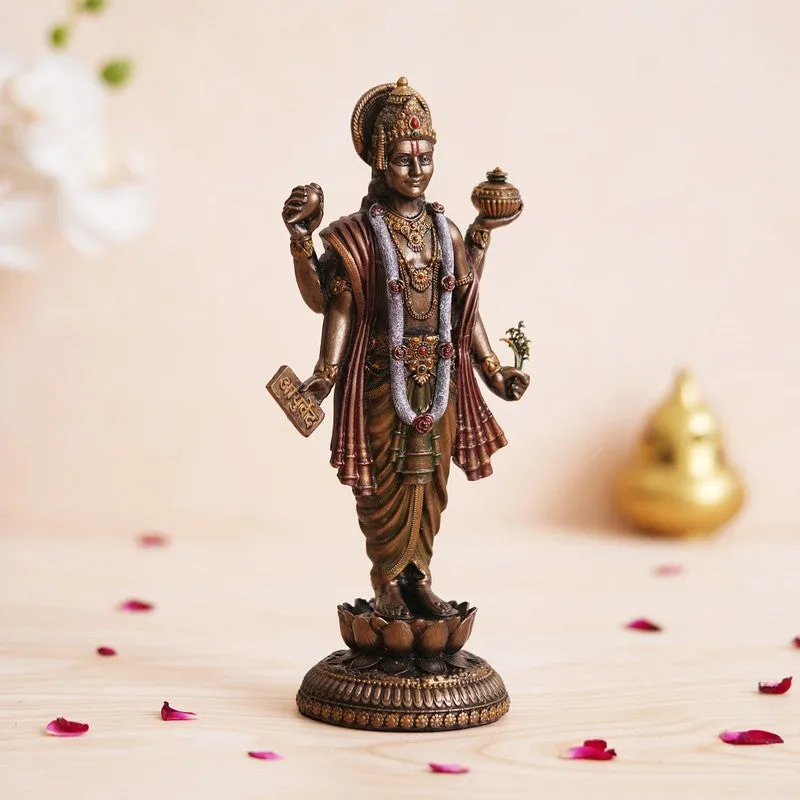 Angled view of a bronze-toned Dhanvantari idol on a carved pedestal