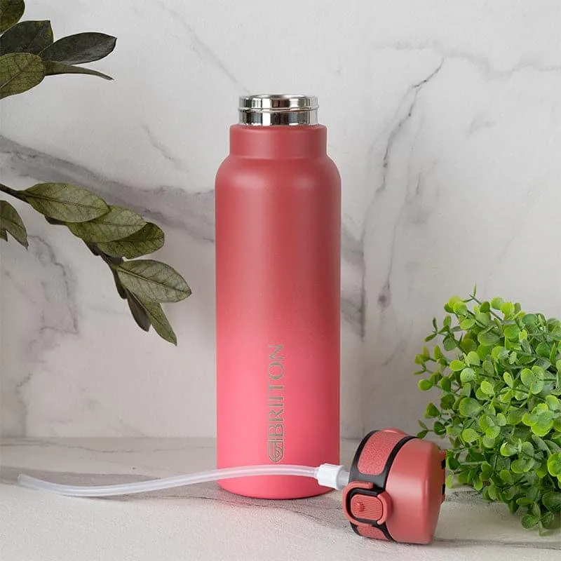 Red bottle displayed with detached lid and clear drinking tube