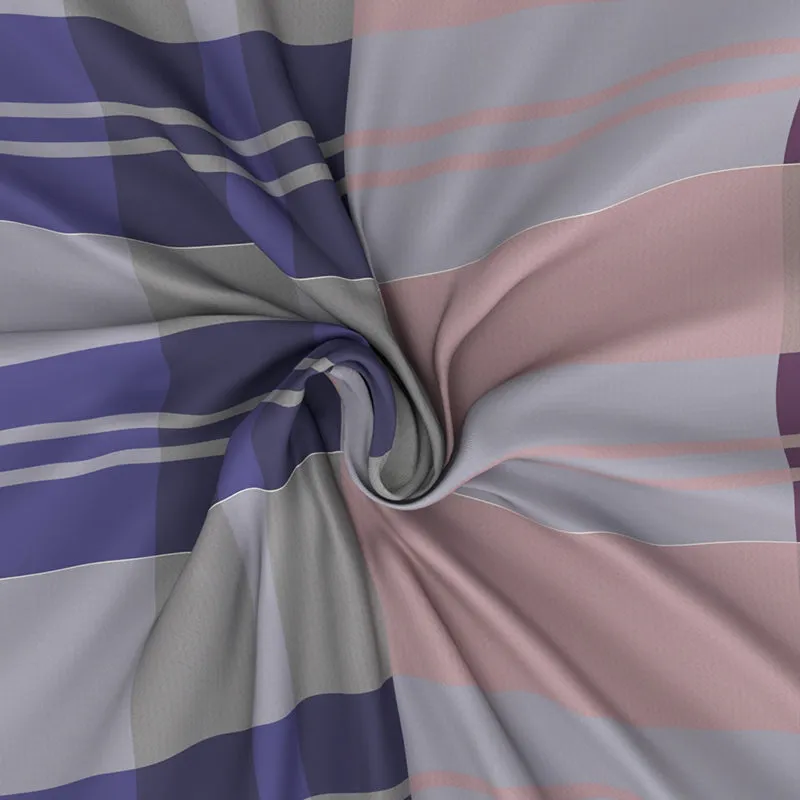 Draped geometric bedsheet showing purple, peach and grey stripes