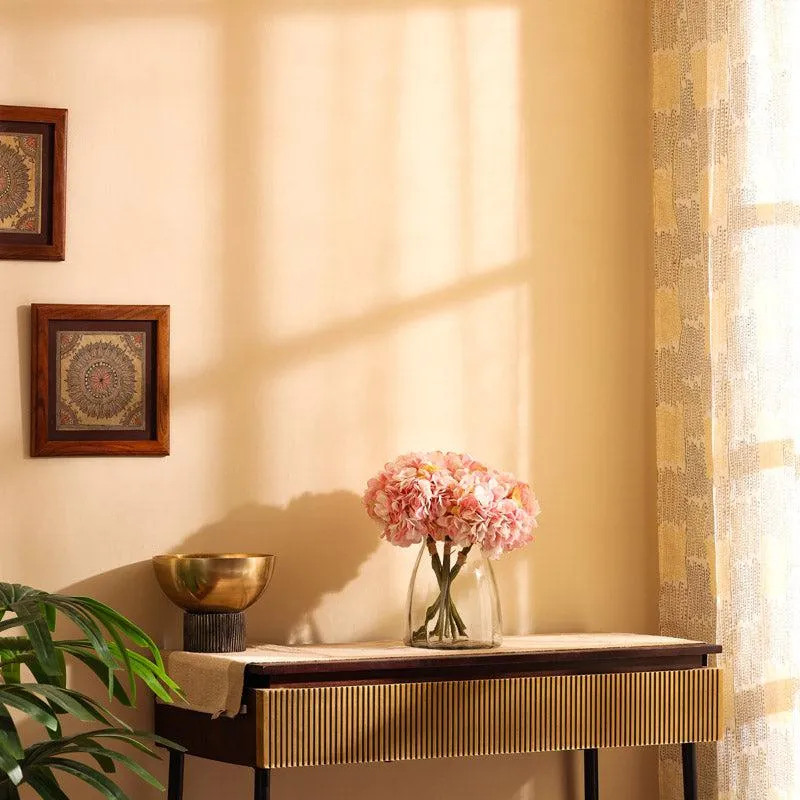 Light pink hydrangea bouquet styled on a living room console