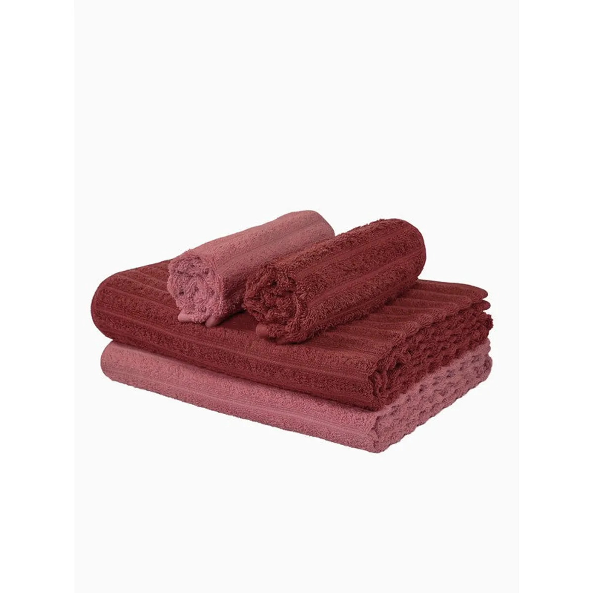 Stacked maroon and pink towels on a white background
