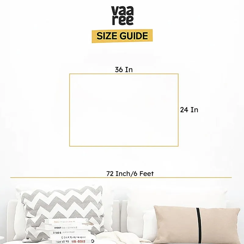 Blank wall art size guide graphic above a white sofa