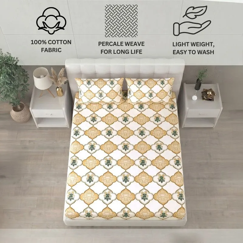 Printed bedsheet spread on bed with matching pillow covers