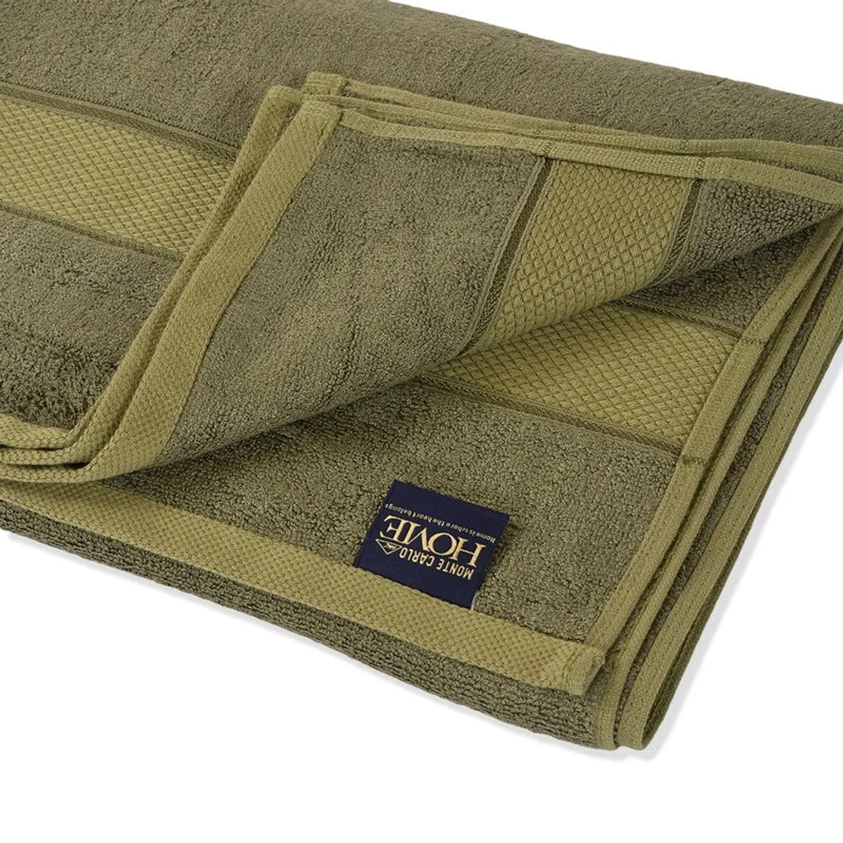 Close-up of the towel's textured border and layered cotton-bamboo fabric